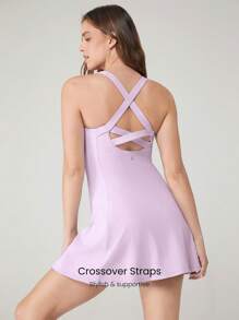 GLOWMODE Vestido activo con pantalones cortos incorporados, bolsillos laterales, agarre antideslizante y escote de tipo pico con tirantes cruzados en la espalda, diseño transpirable y de secado rápido "FeatherFit ™-Air" pensado para ganar, adecuado para tenis, golf, pickleball y uso diario