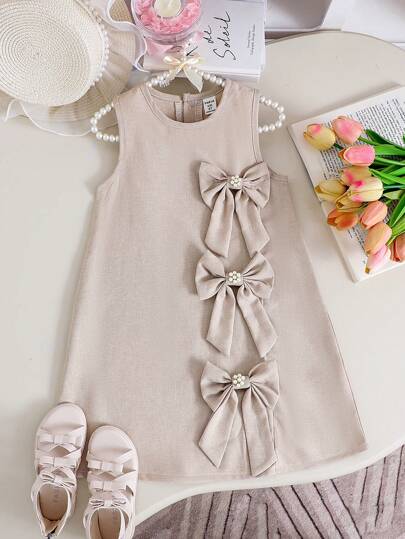 SHEIN 女童夏季无袖大蝴蝶结连衣裙，杏色，优雅别致，甜美可爱的时尚公主裙