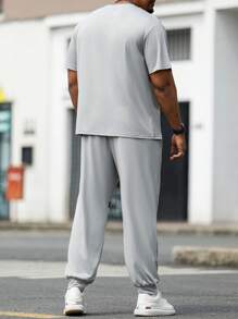 Manfinity Homme Plus Size Men's Summer Striped Printed Casual Short Sleeve T-Shirt And Drawstring Waist Long Sweat Pants Set, For Husband, Going Out Gym Clothes For Men Men Jogging Sets Men Summer Outfits Men T Shirt Co Ords Men Two Pieces Casual - Multicolor - View 2