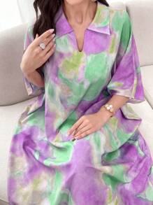 Al Najma Elegantes Batik-Muster Fledermausärmel Kleid im Arabischen Stil