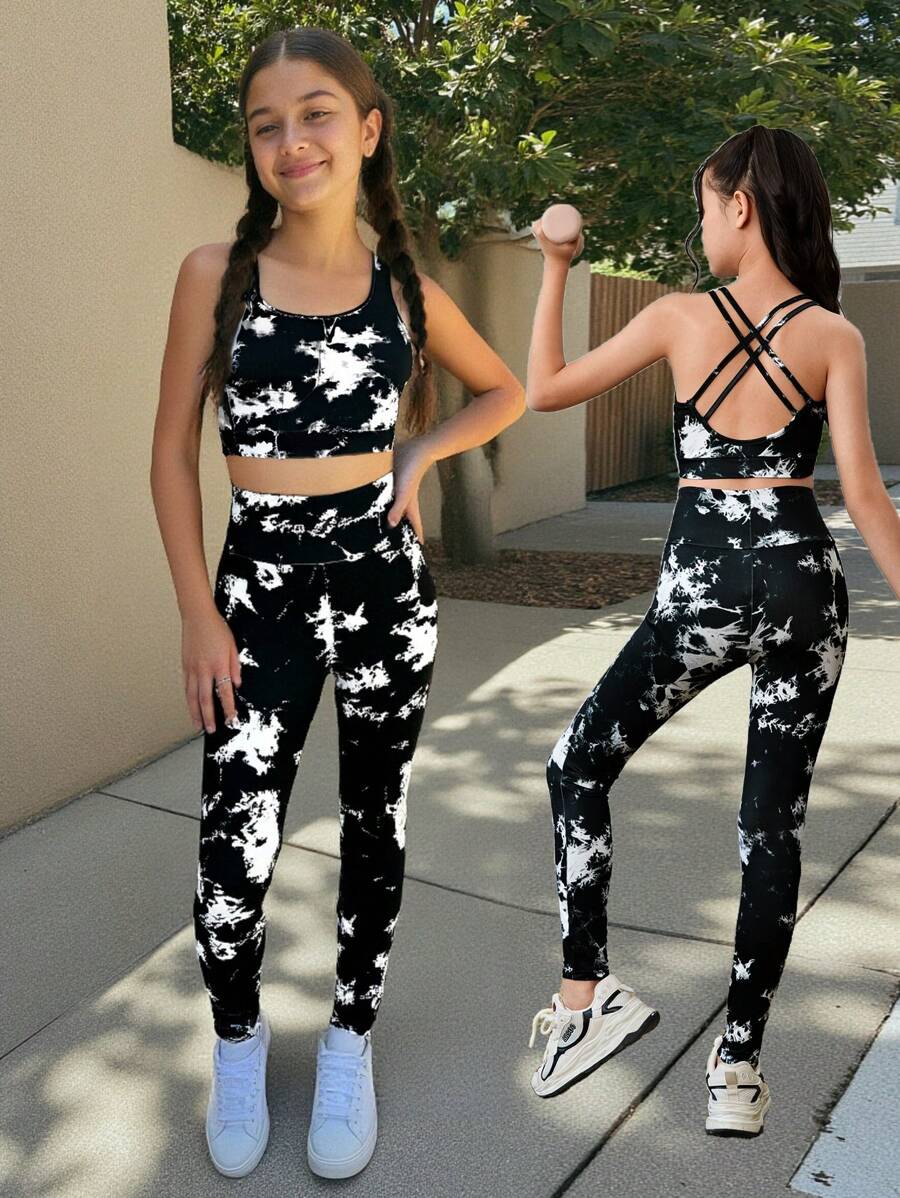 SHEIN Bộ đồ thể thao cho bé gái tuổi mới lớn, áo crop top lưng thun co giãn thoải mái đan chéo và quần legging cạp cao, phù hợp để tập yoga, quay lại trường - màu đen - Xem 1