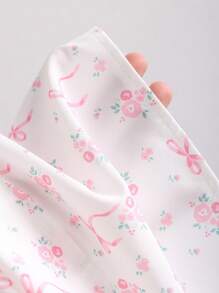 Sweetra Damesjurk met bloemenprint en riem, halternek, vakantiejurk