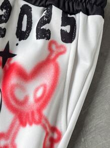 PAVTROS Quần áo trẻ trung dạo phố dành cho nam, có quần nỉ trắng họa tiết Graffiti lấy cảm hứng từ Anime Nhật Bản màu đen và trắng. Chiếc quần này có thiết kế ống côn ở mắt cá chân và thể hiện phong cách Street Rock. Hoàn hảo cho các lễ hội âm nhạc và trang phục hàng ngày, khiến chúng trở thành món quà tuyệt vời cho bạn trai hoặc chồng, phản ánh thời trang đường phố và thẩm mỹ Y2K. Quần nỉ cạp rút họa tiết Graffiti thời trang - Nhiều màu - Xem 5