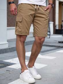 Manfinity Homme Men's Solid Color Flap Pockets Drawstring Waist Cargo Shorts