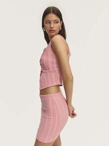 Nöista Conjunto de top y minifalda de color rosa pastel para el verano, con diseño de costura en el pecho y nudo frontal con pequeña abertura. Perfecto para el verano, eventos nupciales o de Pascua