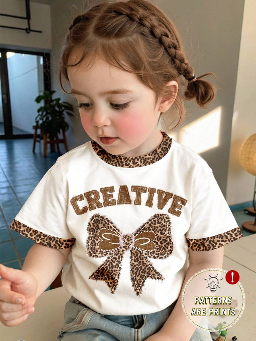SHEIN Leap Crew 年轻女孩休闲豹纹蝴蝶结印花圆领短袖 T 恤，适合夏季