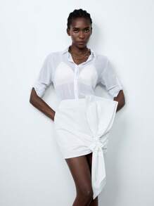 Lumivelle تنورة قصيرة فاشونية للسيدات بألوان صلبة وتصميم فيونكة - أبيض - مشاهدة 5