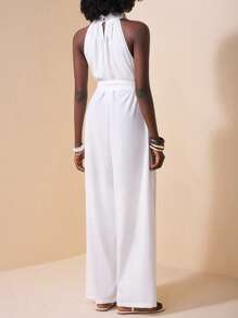 Zivah Grüner Jumpsuit mit weitem Bein, hohem Hals, Schlitz und Taschen -E, für den Urlaub