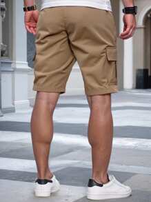 Manfinity Homme Men's Solid Color Flap Pockets Drawstring Waist Cargo Shorts