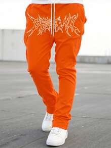 Manfinity EMRG Loose Fit Men's Letter Graphic Drawstring Waist Sweatpants , Sweatpants Graphic , Men Joggers - Orange - View 1