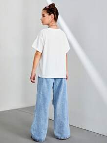 Conjunto de 2 piezas para niñas: Camiseta gráfica de árbol de coco blanco de playa y pantalones vaqueros con pierna ancha y cierre de cremallera desgastados, estilo urbano casual - Blanco - Ver 2