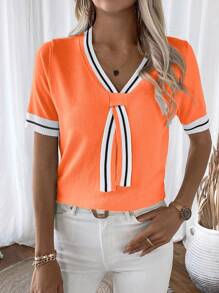 EMERY ROSE كنزة صوف نسائية قصيرة الأكمام بياقة على شكل حرف V، بتصميم بسيط وأنيق للارتداء الصيفي - لون برتقالي - مشاهدة 6