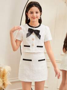 SHEIN Serisse Kids Conjunto elegante de 2 piezas para niña preadolescente, con blusa de tela de tweed con decoración de lazos y botones de perlas imitadas, y falda corte A, estilo dama elegante francés, para volver al colegio