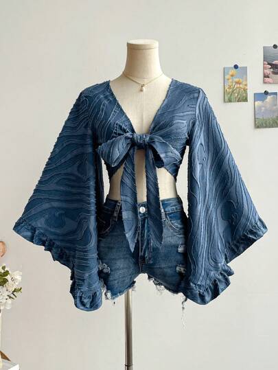 Soleia قميص نسائي كاجوال للصيف بأكمام قصيرة وجيب عقدة أمامية، بتصميم متموج وملمس منسوج، مناسب للهيبي والأسلوب الغربي، وحفلات الموسيقى والعيد ومهرجان الكرنفال وحفلات الشاي بعد الظهر والحفلات