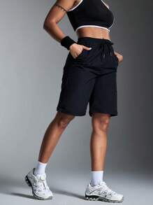 SHEIN Sports بنطلون رياضي للسيدات بخصر سحاب قابل للفصل من اللون الأساسي - الأسود - مشاهدة 2