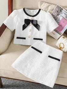 SHEIN Serisse Kids Conjunto elegante de 2 piezas para niña preadolescente, con blusa de tela de tweed con decoración de lazos y botones de perlas imitadas, y falda corte A, estilo dama elegante francés, para volver al colegio