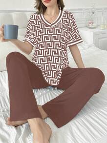 Set de 2 piezas de pijama con estampado geométrico, cuello en V, mangas cortas y pantalones largos de un solo color