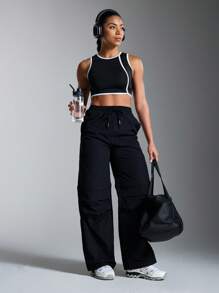 SHEIN Sports بنطلون رياضي للسيدات بخصر سحاب قابل للفصل من اللون الأساسي - الأسود - مشاهدة 9