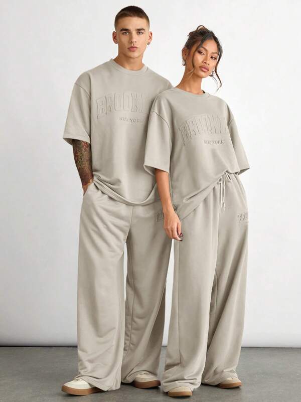Manfinity INSISELF 2 pezzi Set estivo da uomo composto da t-shirt a maniche corte dal collo rotondo e ampia, e pantaloni dritti con vita media e coulisse