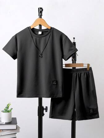 SHEIN 2 stuks/set Tween Boy Summer Casual Effen Kleur Korte Mouw T-shirt en Shorts Set
