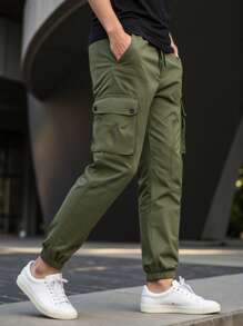Manfinity Homme Pantalones casuales sueltos de unicolor con bolsillos cargo y cordón en la cintura para hombres