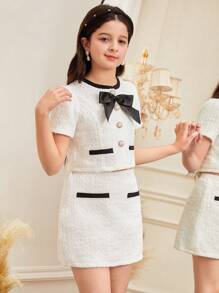 SHEIN Serisse Kids Conjunto elegante de 2 piezas para niña preadolescente, con blusa de tela de tweed con decoración de lazos y botones de perlas imitadas, y falda corte A, estilo dama elegante francés, para volver al colegio