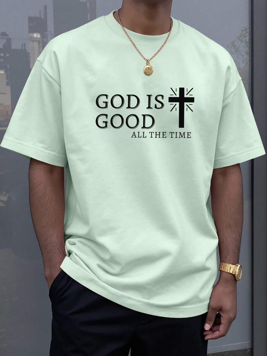 Manfinity LEGND Camiseta de manga corta informal para hombres con estampado de cruz y lema, para el verano - verde menta - Ver 1