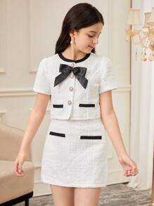 SHEIN Serisse Kids Conjunto elegante de 2 piezas para niña preadolescente, con blusa de tela de tweed con decoración de lazos y botones de perlas imitadas, y falda corte A, estilo dama elegante francés, para volver al colegio