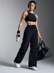 SHEIN Sports بنطلون رياضي للسيدات بخصر سحاب قابل للفصل من اللون الأساسي - الأسود - مشاهدة 5