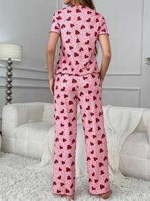SHEIN Conjunto de pijama de mujer con pajarita, estampado de corazón, manga corta y pantalón largo