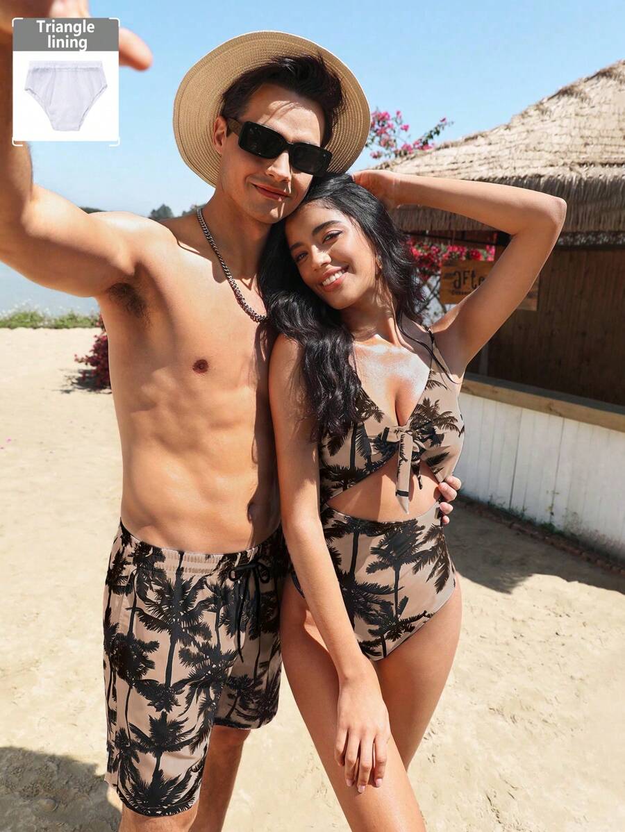 Manfinity VDAYZ Shorts de playa con cordón de cintura y estampado asimétrico de palmera para hombres - Multicolor - Ver 1