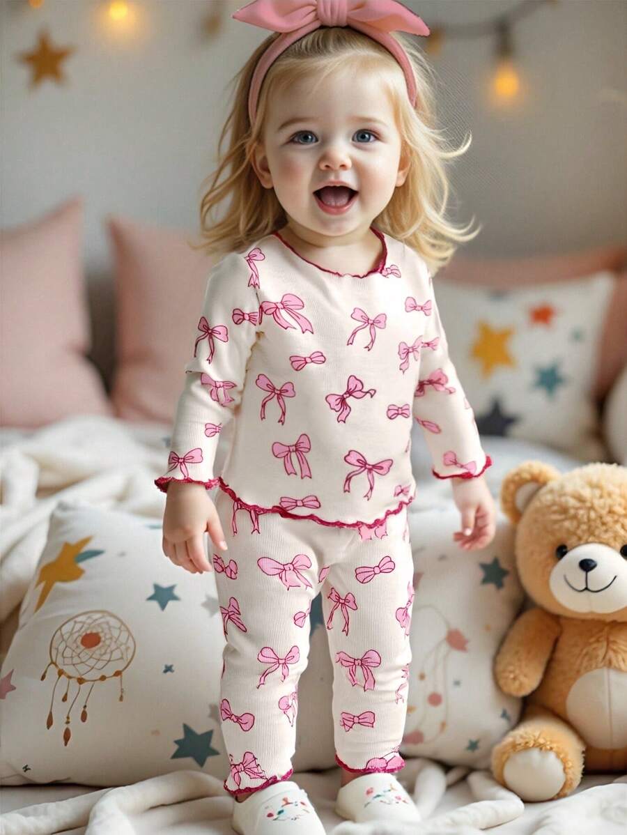 SHEIN Playful Pals 2 件套女婴幼儿 0-3 岁可爱甜美休闲日常趣味图案蝴蝶结罗纹针织圆领长袖修身 T 恤和修身裤装，适合家居穿着 - 杏色 - 查看 1