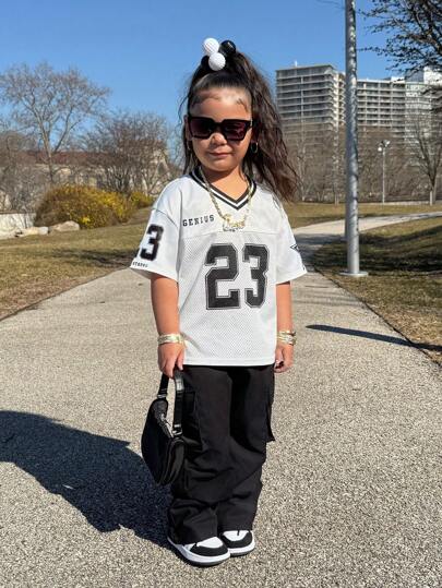 SHEIN Conjunto informal de 2 piezas de sudadera suelta con gráfico y pantalones para niñas