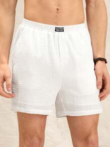 Manfinity VCAY Pantalones cortos casuales con logo decorativo de cinta, cintura media, ajuste ceñido, apropiados para uso diario, unisex