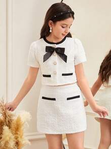 SHEIN Serisse Kids Conjunto elegante de 2 piezas para niña preadolescente, con blusa de tela de tweed con decoración de lazos y botones de perlas imitadas, y falda corte A, estilo dama elegante francés, para volver al colegio