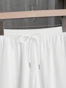 Manfinity Homme Ensemble chemise à manches courtes et pantalon de couleur unie décontracté pour hommes