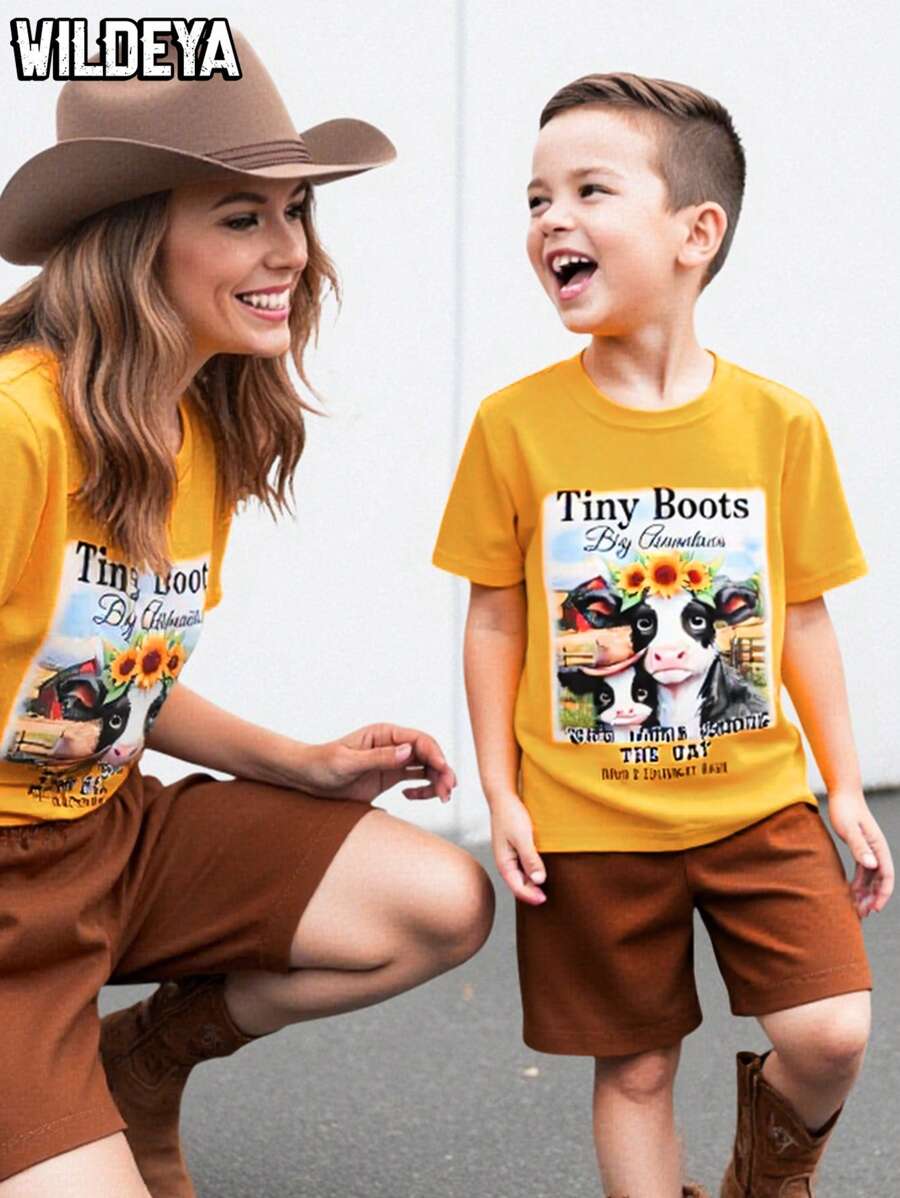 SHEIN 2025 Young Boys Spring/Summer New Casual Comfortable Versatile Khaki Top With Cute Cow & English Print, Paired With Brown Shorts, 2pcs Set, Suitable For Daily Wear, Outdoor Play, And Family Vacation Toddler Boy Western Clothes Toddler Summer Boy Clothes - Apricot - View 1