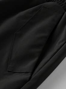 Manfinity EMRG Shorts décontractés pour hommes avec cordon de serrage à la taille, poche cargo, couleur unie