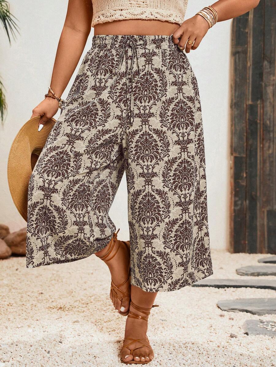 SHEIN VCAY Pantalones capri de pierna ancha con estampado floral de talla grande, simples y elegantes, adecuados para el verano - Café integral - Ver 1