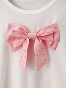 Conjunto rosa para niñas, camiseta blanca con lazo de strass desmontable, de moda y lindo, de tejido de punto, suave y cómodo, combinado con falda de pastel con volantes, cómodo y elegante, esencial para salidas de primavera/verano