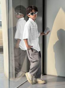 2 Stücke/Set Tween-Jungen Lässig Koreanischer Stil Buchstaben- und Grafik Muster Kurzarm Hemd und weite 7/8 Hose Set