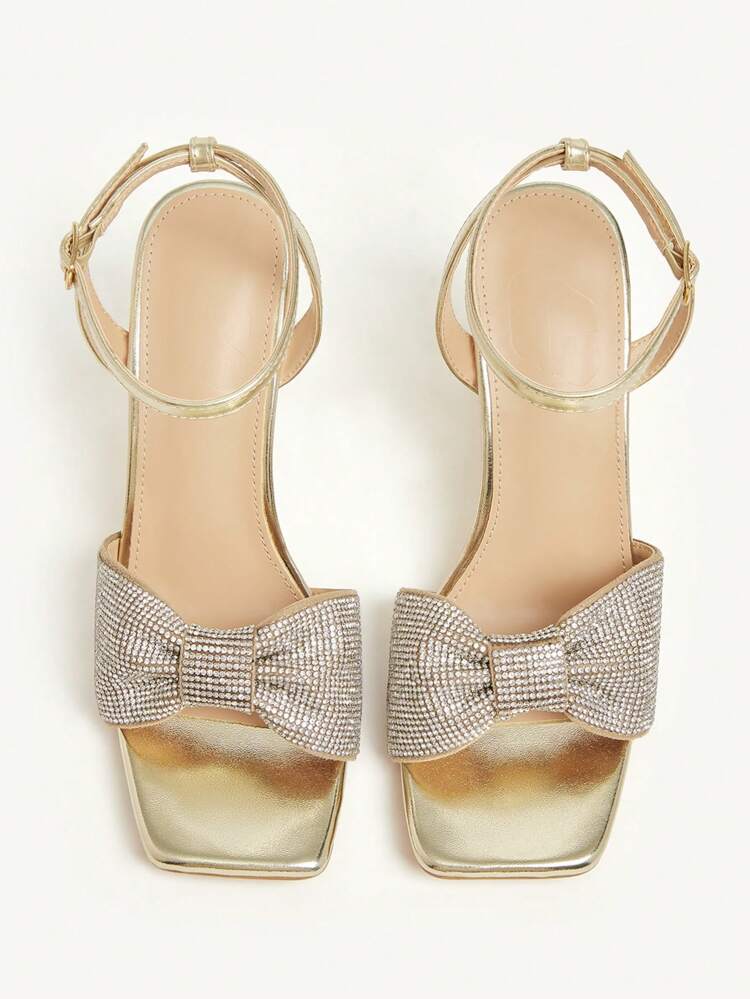 CUCCOO CHICEST Sandalias de tacón bloque con punta fina y adorno de lazo de strass, zapatos de tacón alto de lujo dorados, zapatos elegantes para fiesta/noche de moda para mujeres