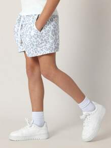 SUMWON Conjunto casual de verano para niñas pre-adolescentes con camiseta de bebé con estampado de leopardo y pantalones cortos deportivos a juego, conjunto de prendas de estar en casa perfecto para actividades de primavera y verano