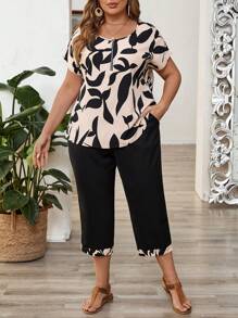 EMERY ROSE Set da 2 pezzi T-shirt a maniche corte e pantaloni capri per donne curvy, t-shirt con collo tondo e taschino, set coordinati semplici e alla moda, adatti per l'estate, vacanza, uscite, festival, Pasqua