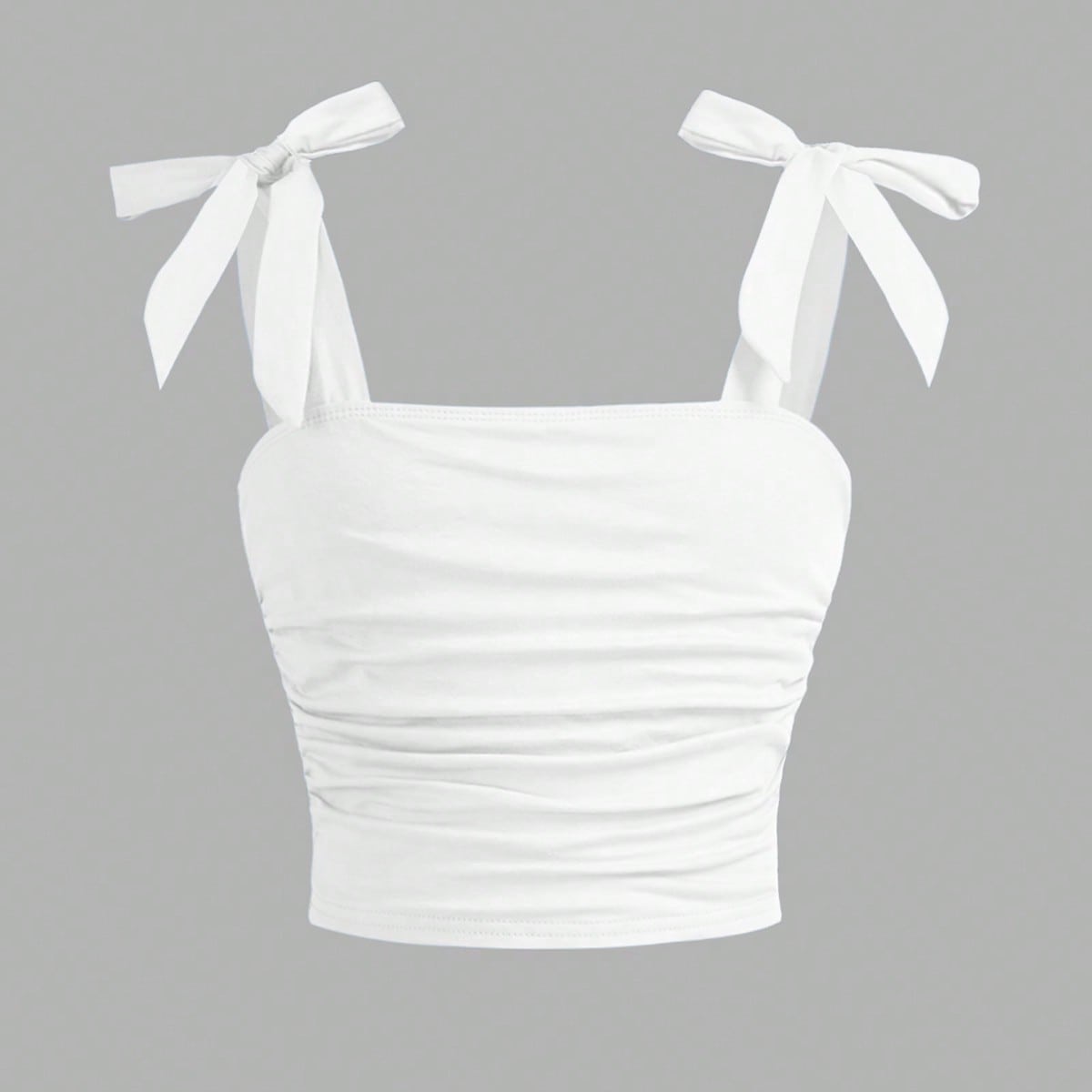 Top camisero elegante, ajustado y de un solo color con lazo en el hombro y plisado lateral para niña preadolescente