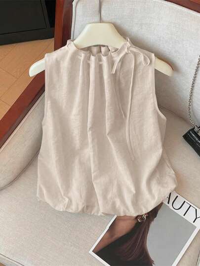 Franclia Elegant Sleeveless Elastic Hemline Loose Drawstring Collar Textured Woven White Blouse For Women, Spring/Summer