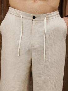 Manfinity Nomadique Pantalones casuales rectos y holgados con cordón en la cintura de unicolor para hombre