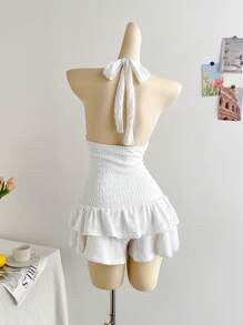 Soleia Damen Urlaubs-Strick-Knitterstoff-Romper mit tiefen V-Ausschnitt am Träger, gerüschtem Saum, geeignet für Party, Date, Nachmittags-Tee, Modemeile und Urlaubsoutfit am Strand