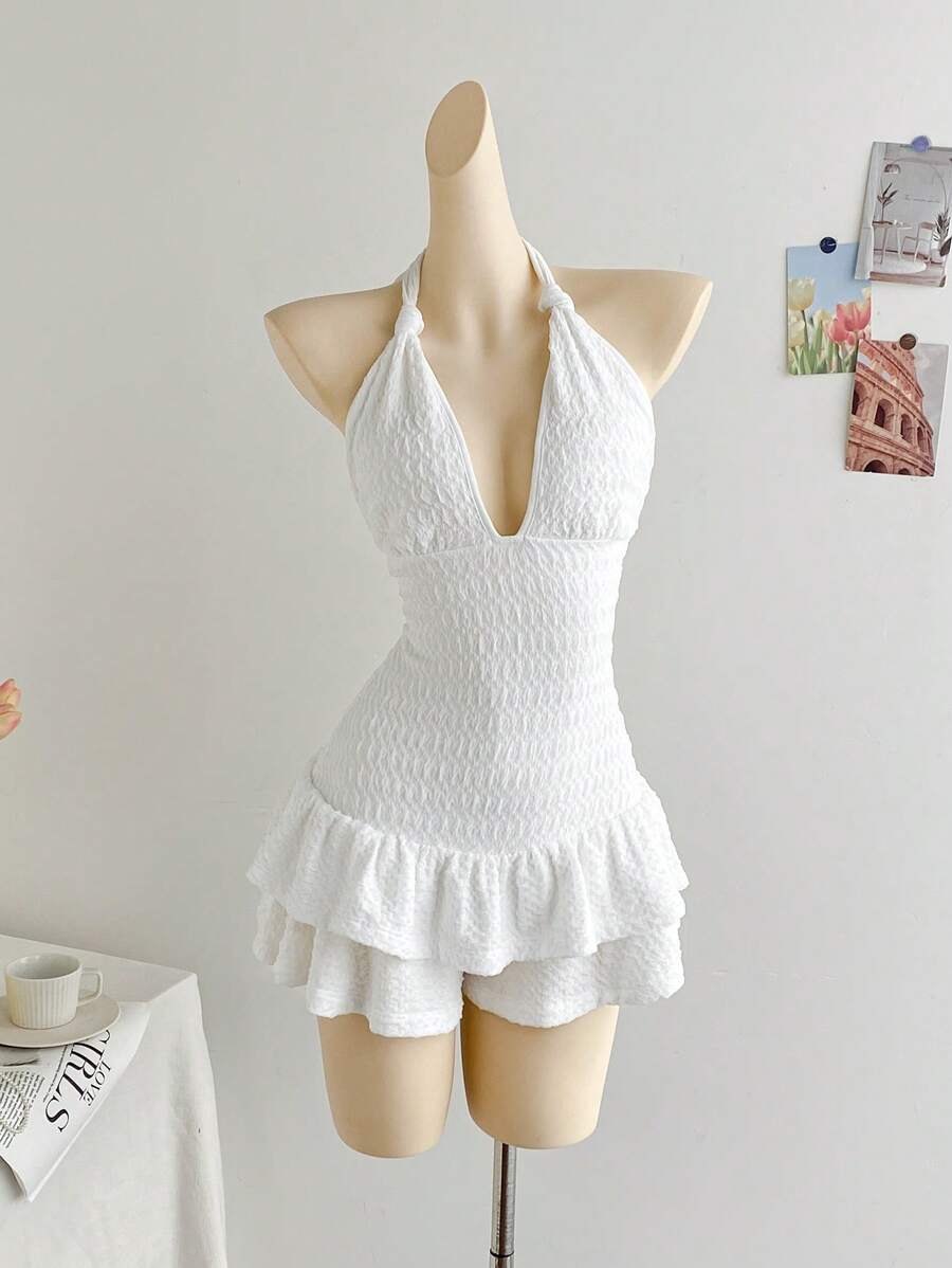 Soleia Damen Urlaubs-Strick-Knitterstoff-Romper mit tiefen V-Ausschnitt am Träger, gerüschtem Saum, geeignet für Party, Date, Nachmittags-Tee, Modemeile und Urlaubsoutfit am Strand