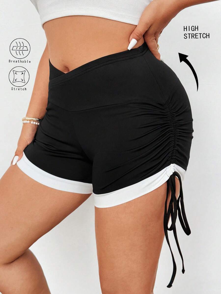 Breezaya 大码优雅简约运动休闲高腰抽绳拼色不对称短款紧身裤